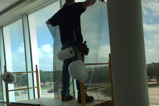 Comercial storefront window tinting installation aventura Pompano Beach